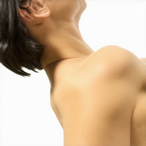 Person gently stretching neck in ergonomic workspace.